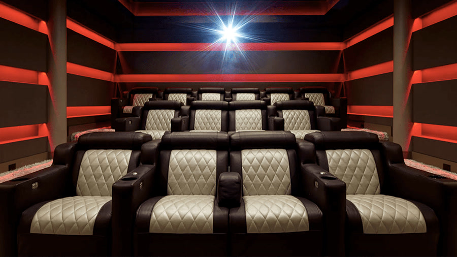 The Reyes — custom home theater by AcousticSmart with Transformer Genesis seating in quilted Bentley pattern