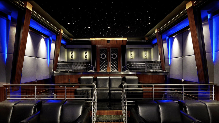 The Norman — grand-scale AcousticSmart home theater with theatrical millwork and immersive entry