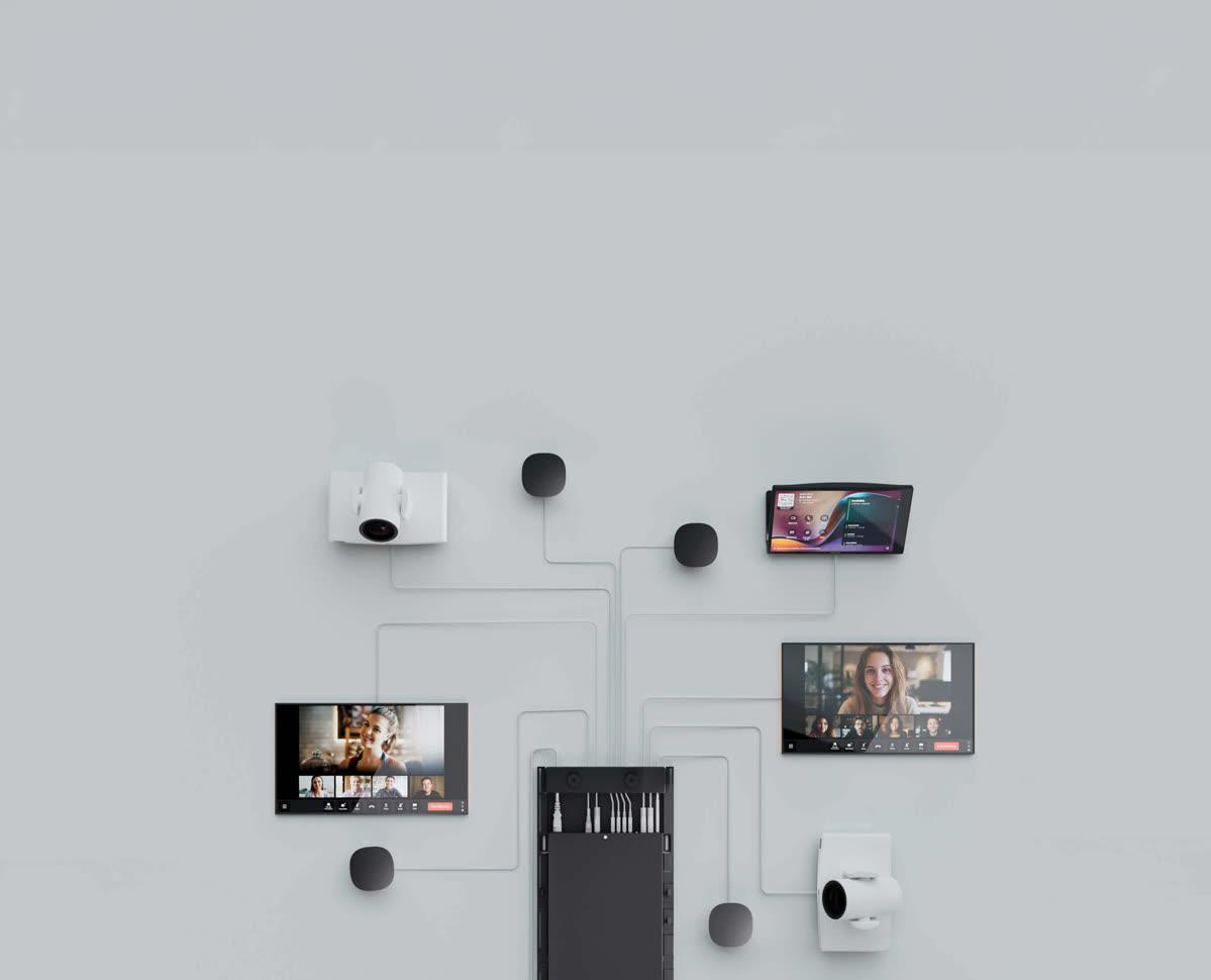 Crestron collaboration cameras, displays, microphones, and touch control arranged for a modern meeting room
