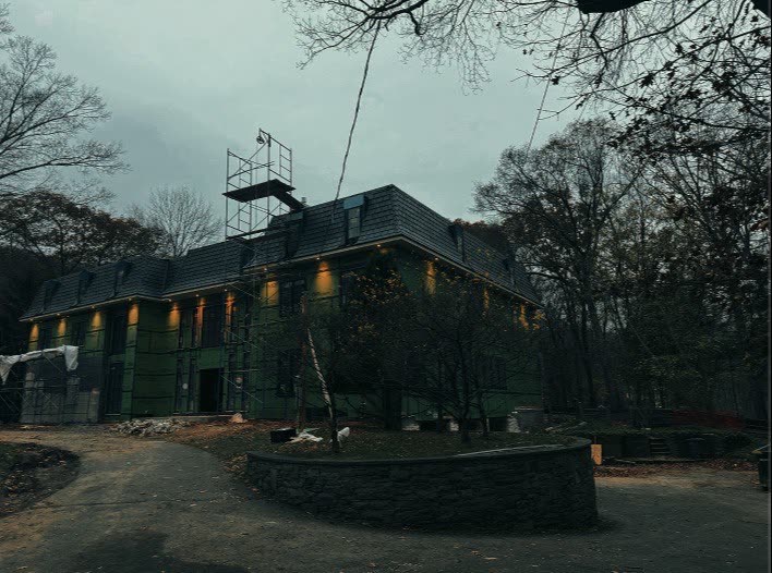 Elite Electrical Contracting home exterior shown during construction with temporary site work visible