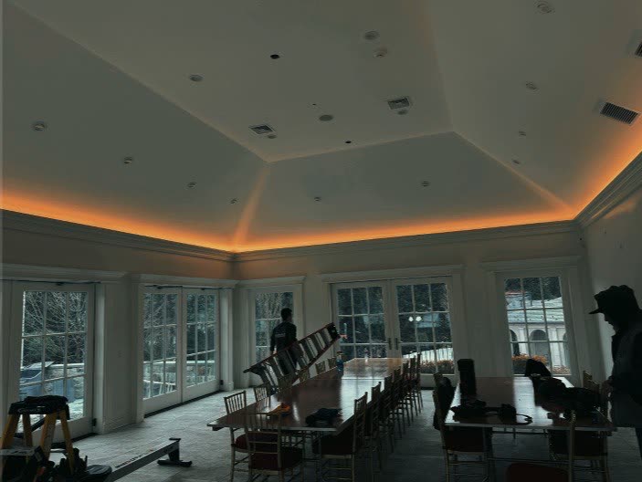 Elite Electrical Contracting residential room with perimeter ceiling lighting and recessed fixtures