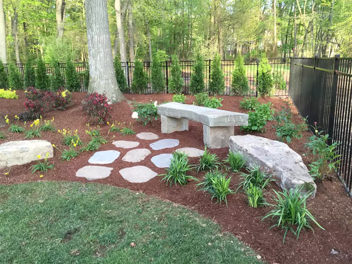 Terracare Landscaping foundation planting design with layered shrubs and ornamental trees around a Northern New Jersey home