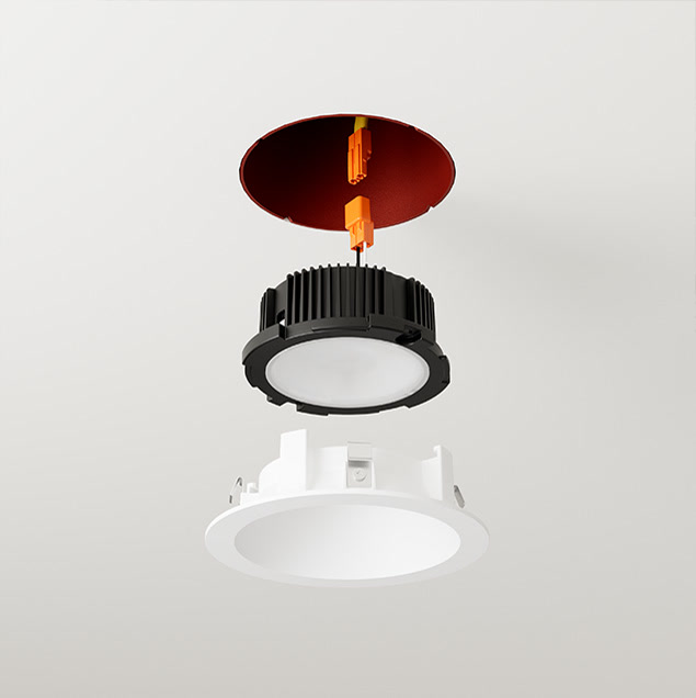Overview of an adjustable downlight module emphasizing modular components