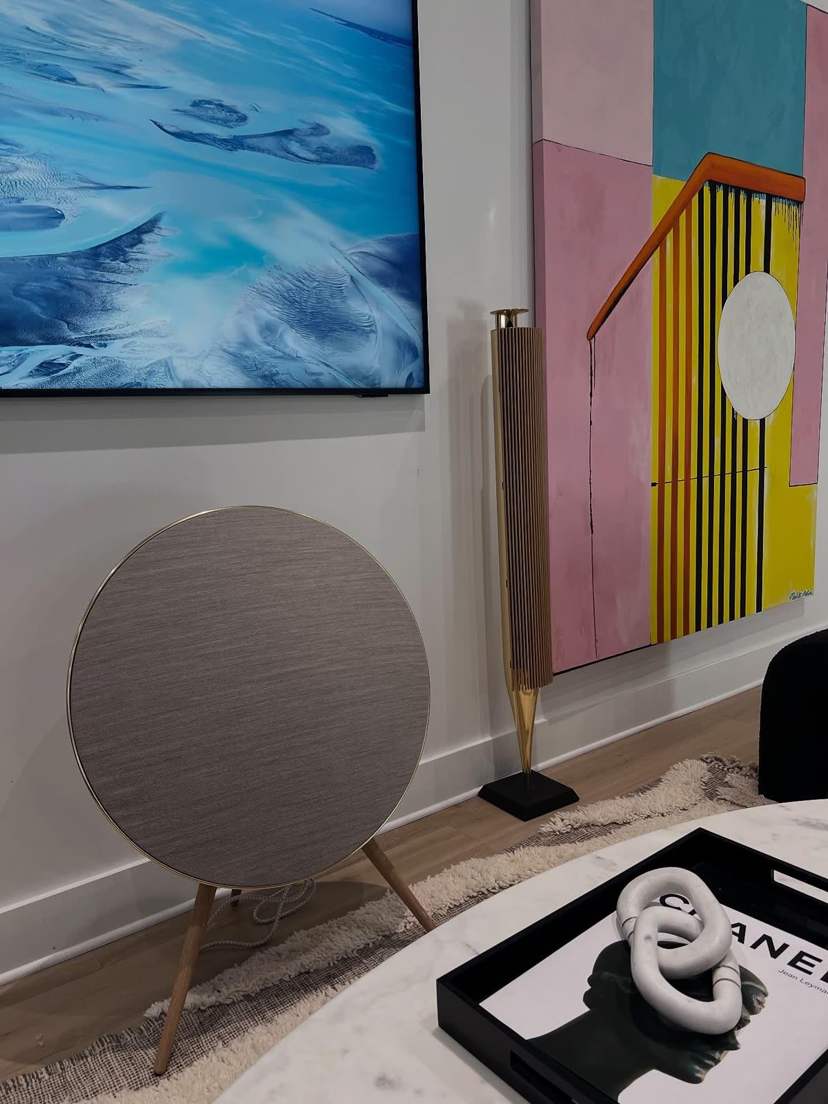 Bang and Olufsen BeoPlay A9 speaker in a colorful HomeTroniX listening room installation alongside Beolab 18