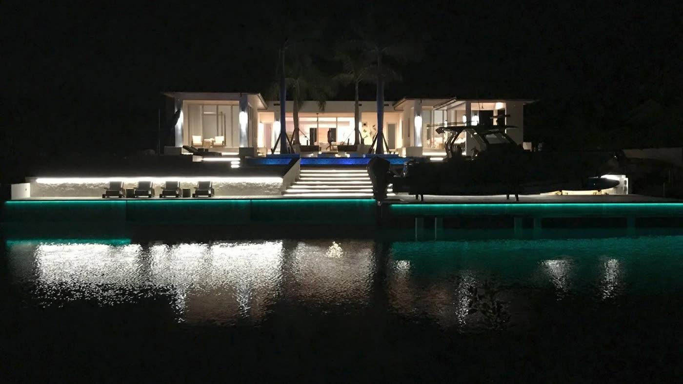 Island Media Systems yacht and oceanfront villa night lighting and AV integration at Grace Bay Providenciales