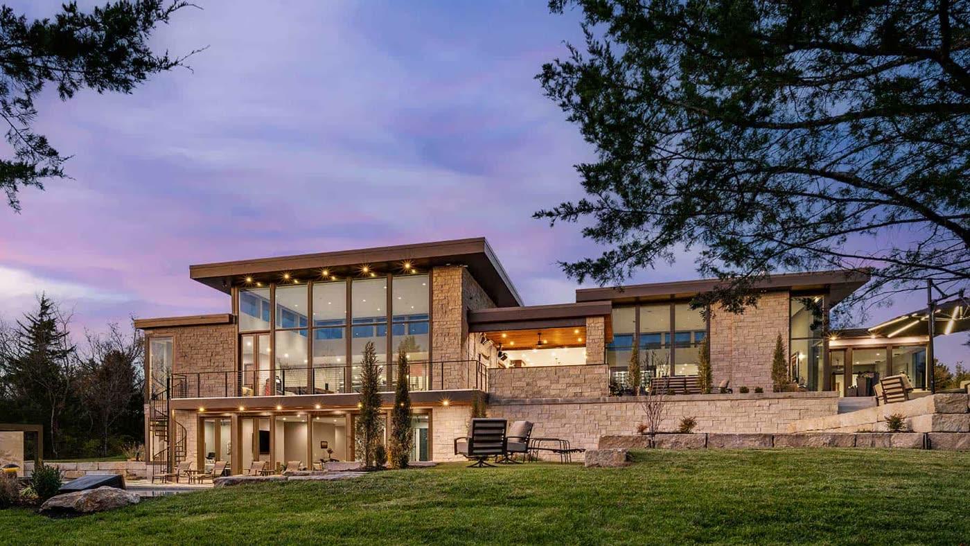 Simplicity KC dusk exterior of a Crestron-automated Overland Park area contemporary home