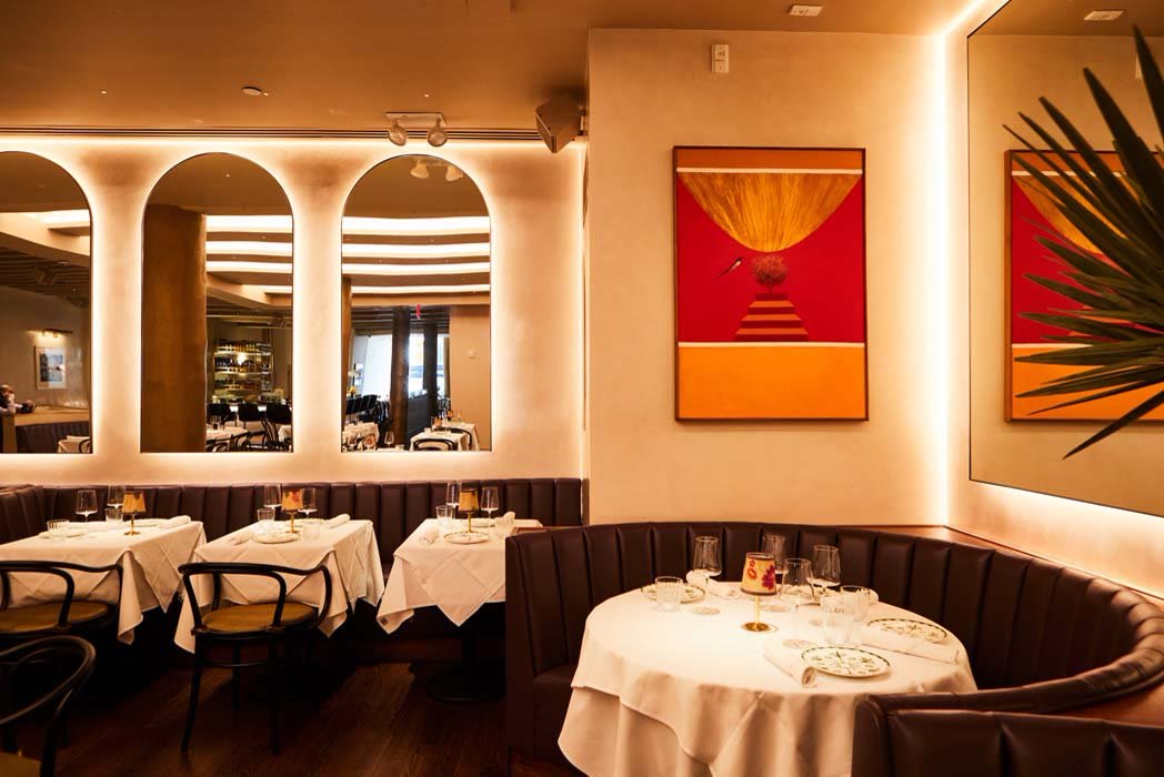 Sona restaurant interior in New York City with architectural lighting by Tirschwell & Co.